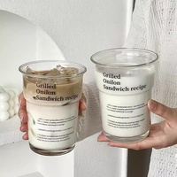 Verres à café imprimés de gobelet en verre de lait transparent à haute teneur en borosilicate de lettre Offre Spéciale