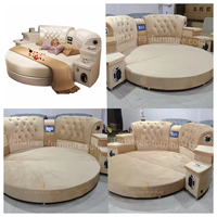Lit rond de luxe avec table de chevet intelligente, lumière LED, haut-parleur, charge sans fil, lit plateforme rembourré moderne pour meubles de chambre