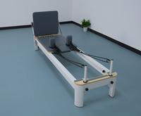 Appareil de Pilates Reformer en aluminium massif blanc pour usage commercial en studio de fitness