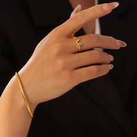 Ensemble de bijoux en forme de nœud, bague ou bracelet 0,2x1,5 cm pour femmes, en acier inoxydable plaqué or, classique, 2 styles, vente en gros