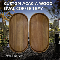 Vente en gros d'assiettes ovales en bois d'acacia massif avec logo personnalisé gravure polissage pour café service à thé occasions de fêtes pour hôtels