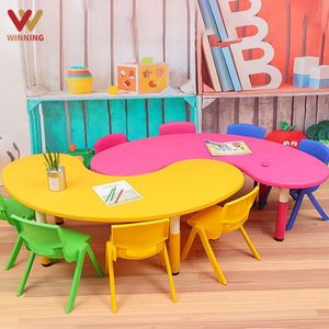 ชุดโต๊ะเก้าอี้พลาสติกสำหรับเด็กอนุบาลรูปทรงพระจันทร์ เฟอร์นิเจอร์โรงเรียนมอนเตสซอรี่ ศูนย์รับเลี้ยงเด็ก <span class=keywords><strong>โต๊ะ</strong></span>เด็ก ชุดเก้าอี้พลาสติก สำหรับห้องเรียน ศูนย์การเรียนรู้สำหรับเด็กก่อนวัยเรียน - Product Image 1