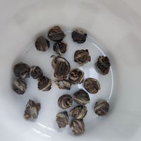 Pabrik Cina kualitas terbaik Jasmine mutiara teh naga baru diproses bola Boba daun kesehatan longgar teh kotak kemasan jumlah besar