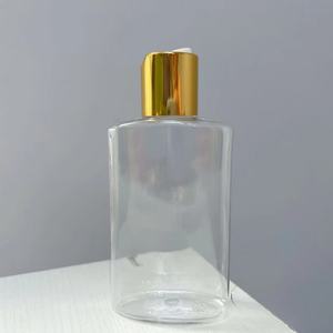 ขวดพลาสติกทรงแบนแบบใหม่ ขนาด 150 มล. 200 มล. พร้อมฝาจุกแบบดิสก์ สำหรับบรรจุภัณฑ์น้ำมันหอมระเหย แชมพู และผลิตภัณฑ์สำหรับเดินทาง - Product Image 1