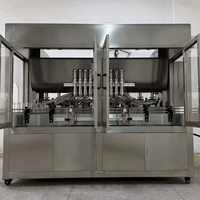 Machine de remplissage automatique de liquides pour huile lubrifiante / huile moteur diesel / huile moteur automobile / scellage de bouchons / étiquetage