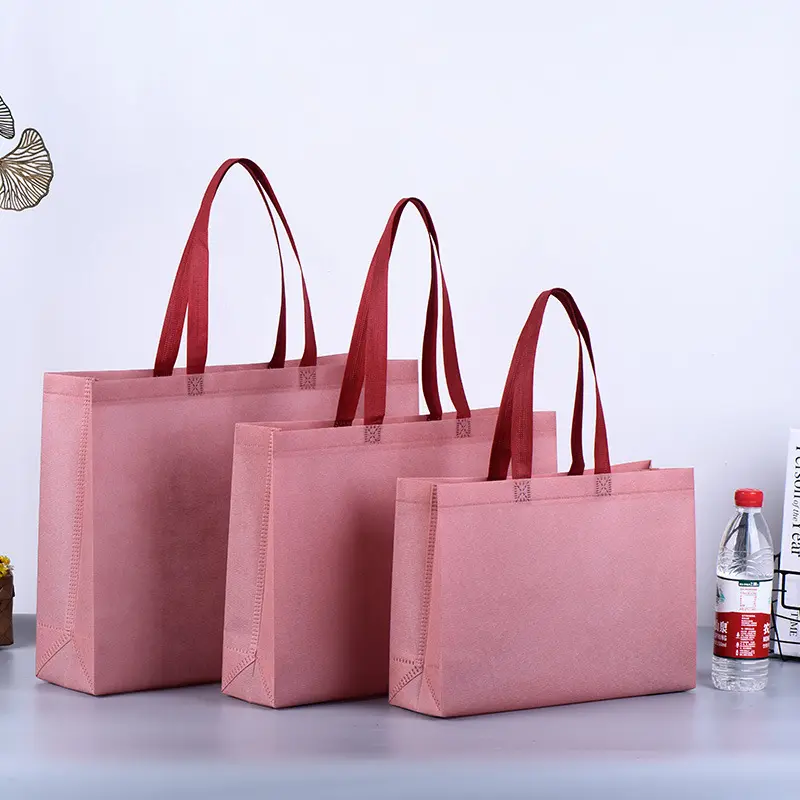 Vente en gros de sacs de courses promotionnels sac fourre-tout en plastique imprimé avec logo personnalisé sacs à provisions non tissés