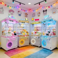 Machine à griffes pour attraper les poupées, fabrication OEM, vente en gros, designs métalliques personnalisés pour les aires de jeux pour enfants, centres commerciaux et salles de jeux