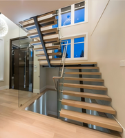 Escalier monopoutre sur mesure d'usine de Foshan, escalier intérieur à poutre simple en acier, marches en chêne, garde-corps en verre trempé, villa duplex