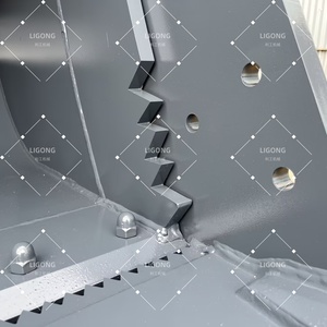 Seau multifonction 4 en 1 avec mâchoire avant pouvant se refermer autour d'objets tels que des bûches, des roches et des branches pour les ramasser et les déplacer. - Product Image 5