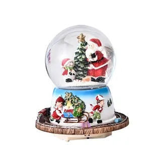 Globes d'eau de noël train rotatif père noël arbre bonhomme de neige musique légère boule de neige boule de neige ornement vente en gros
