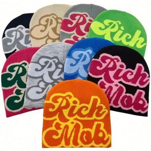 Vente en gros de bonnets d'hiver tricotés personnalisés en acrylique avec impression intégrale unisexe, bonnets jacquard Skully - Product Image 1