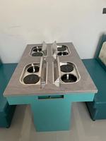 Les grossistes d'usine proposent des tables à fondue et à griller double face à aspiration, de bonne qualité et à bas prix.