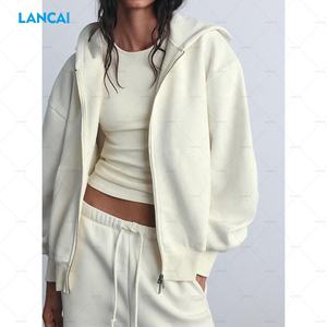 Sudadera con capucha y cremallera completa en blanco de rizo de algodón para mujer de alta calidad personalizada y pantalones de chándal holgados a juego Beige conjunto de 2 piezas para mujer - Product Image 2