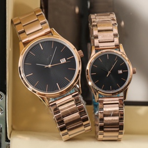 Montres rondes minimalistes pour lui et pour elle, avec index simples et bracelet en métal poli Omegaes - Product Image 1