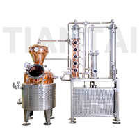 Colonne de distillation semi-automatique 200L hybride en cuivre avec colonne de reflux en verre pour la production industrielle de vodka, gin et whisky