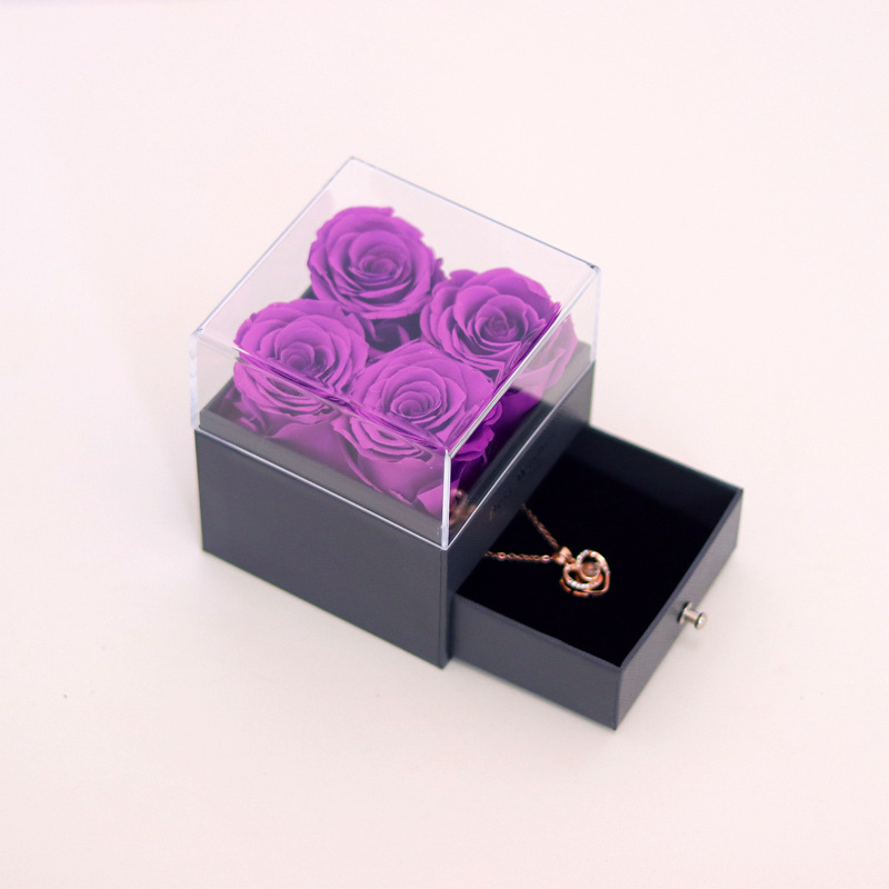 Boîte à bijoux avec 4 fleurs violettes sans collier