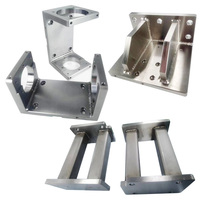 Supports de montage personnalisés en aluminium et acier inoxydable usinés CNC, avec tolérance de précision EDM pour systèmes mécaniques d'automatisation robotique
