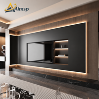 Meuble TV mural noir avec panneau rétroéclairé, console de rangement et armoire TV en noyer pour salon d'appartement meublé