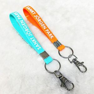 Customised Silicone Wristband Keychain with Keyring Fully Embossed with Your Logo or Text - Product Image 3