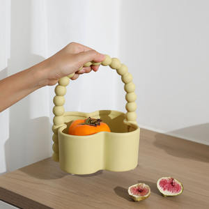 Plato de fruta de cerámica de nuevo diseño al por mayor frutos secos aperitivos plato para servir <span class=keywords><strong>cesta</strong></span> con <span class=keywords><strong>cesta</strong></span> de mano almacenamiento de alimentos platos de decoración - Product Image 1