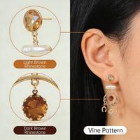 Boucles d'oreilles pendantes en alliage plaqué or antique, style bohème, avec strass marrons et perles blanches