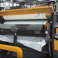 Machine de ruban roulant adhésif thermofusible à haute productivité pour le masquage et le ruban de papier crêpé avec machine de découpe