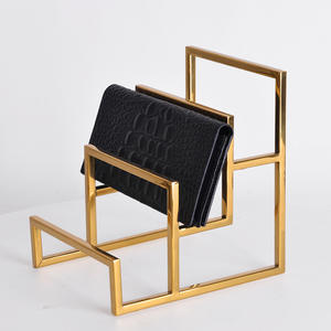 Expositor escalonado de acero inoxidable para carteras y ropa de hombre y mujer, para mostrador de centro comercial transfronterizo - Product Image 1