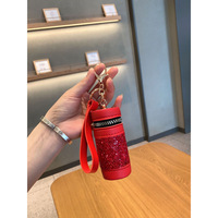 Nouveau style de luxe léger pour influenceurs, porte-clés pendentif pour femme en PU haut de gamme, incrusté de diamants, avec pochette à monnaie portable et pochette rouge