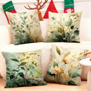 수채화 식물 그림이 그려진 장식 쿠션은 아늑한 소파를 장식하고, 배경에는 축제 분위기의 양말과 사슴 뿔이 있습니다. - Product Image 1