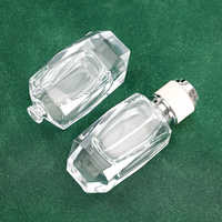 Flacon de parfum en verre transparent multi-facettes de 50 ml avec bouchon rose et argenté - Design de luxe à facettes de diamant pour emballage de parfum unisexe
