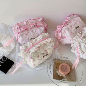 Pochette élégante rose à nœud et fermeture éclair, pochette mignonne, trousse de toilette de voyage, sac de rangement pour articles menstruels, sac de maquillage matelassé pour femmes et filles - Product Image 1