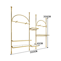 Porte-vêtements modulaire en acier inoxydable plaqué or PVD personnalisé pour boutique haut de gamme