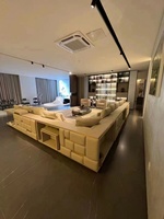 Canapé d'angle en cuir véritable sur mesure pour grand salon de villa, grand canapé modulaire de style moderne, luxueux et minimaliste