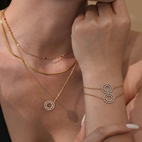 Ensemble de bijoux collier et bracelet YF8351 5A avec pendentif rond en zircon, plaqué or 18 carats, acier inoxydable étanche
