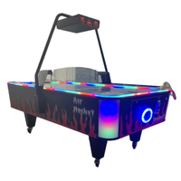Machine à jetons de jeu d'arcade de table de hockey sur air rougeoyante de feu 2 en 1 Airhockey pour Game Center à vendre