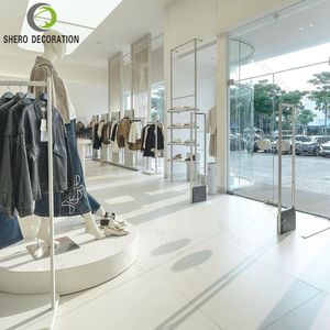 Ideas de decoración para tiendas de ropa modernas: expositor de ropa metálico, soporte de ropa personalizado y duradero para prendas. - Product Image 4