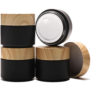 Pot cosmétique rond de luxe rechargeable pour masque pour les yeux et le visage, crème, 1 oz, 50, 100 ml, pot en verre noir mat avec couvercle en plastique imitation bois - Product Image 1