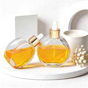 Bouteilles en <span class=keywords><strong>verre</strong></span> transparentes, plates et rondes, vides, pour huiles essentielles, parfums, huiles capillaires, avec compte-gouttes, 50 ml, 60 ml, 100 ml - Product Image 4