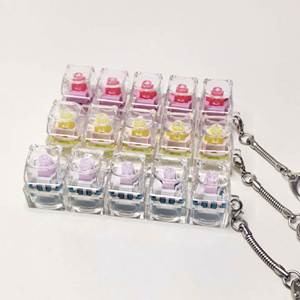 Juguete descompresivo transfronterizo de PVC con diseño de llavero, tipo PC3 Key 4 Key, con botón de eje de prueba para teclado mecánico y función de apretar - Product Image 6