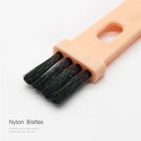 Petits objets utiles Cuillère à mesurer rose 2-en-1 pour la maison Brosse en nylon unique de 5 ml à 2 grammes à vendre dans un magasin à un dollar