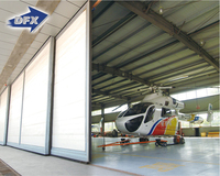 Qingdao Hangar en acier industriel pré-fabriqué Conception de cadre de portail à portée claire Porte coulissante Application d'entrepôt Structure en acier
