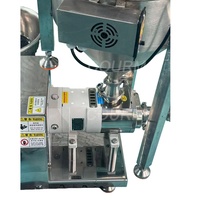 Machine de remplissage semi-automatique à double pompe à vis pour sauces chocolatées, beurre de cacahuète, émulsions et gels, avec trémie de mélange à spirale chauffée