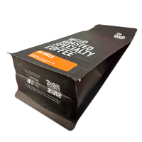Sac à fond plat en papier kraft biodégradable noir imprimé sur mesure, pochette à fermeture quadruple avec valve de dégazage unidirectionnelle pour grains de café