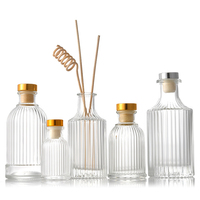 Bouteilles de diffuseur de roseaux en verre transparent vintage gravées de 50 ml, 100 ml, 200 ml, vases décoratifs ronds miniatures pour boutons de fleurs, vente en gros