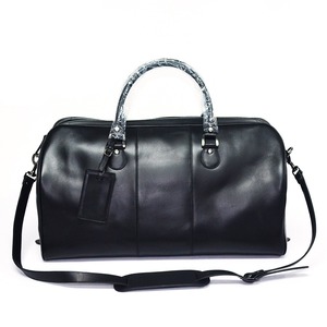 กระเป๋าเดินทางแบบนิ่มหนังแท้สีดำสำหรับผู้ชายผู้หญิง30-40L ขนาดใหญ่ทนทาน - Product Image 1