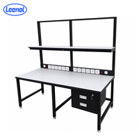 Banc de travail fixe ESD noir Leenol avec panneau perforé et éclairage LED pour ligne de production électronique