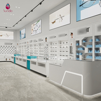 Sundo Sundo : Projet de pose clé en main pour opticien, vitrine de présentation de lunettes, comptoir, aménagement intérieur de magasin, fabricant de présentoirs pour lunettes de soleil