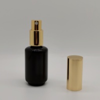 Emballage cosmétique de bouteille de pompe en verre de haute qualité 30ml bouteille ronde de fond en verre noir brillant bouteille d'huile avec pompe à lotion