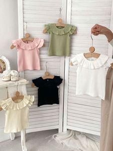 Mùa Hè Mới Cô Gái Bay Tay Áo Tops Ruffle Cổ Trẻ Sơ Sinh Rắn Colour T-Shirt Mỏng Quần Áo Trẻ Em - Product Image 3