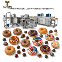 Ligne de production de bâtonnets de bretzel enrobés de chocolat avec unité de revêtement par fusion et tunnel de refroidissement